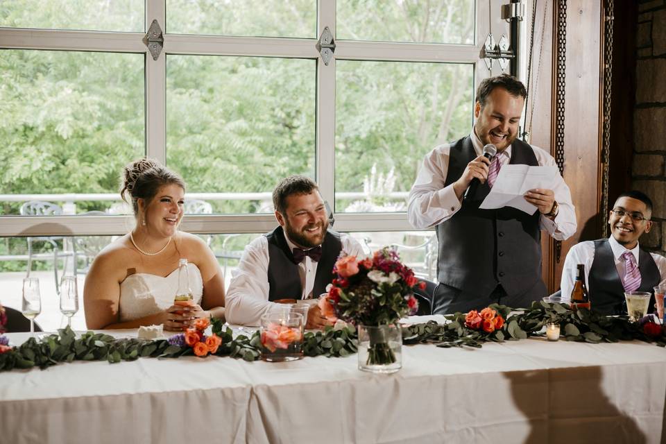 Toasting for new Mr. and Mrs.