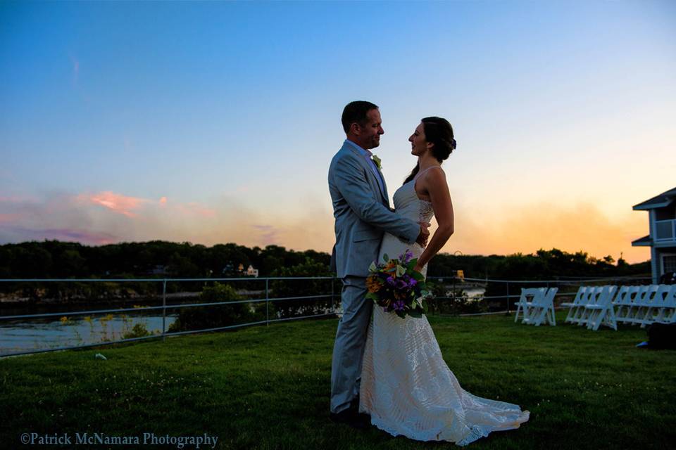 Sunset overlooking the ceremony site and entrance to York River. Our oceanfront guest rooms are in the background on the right.