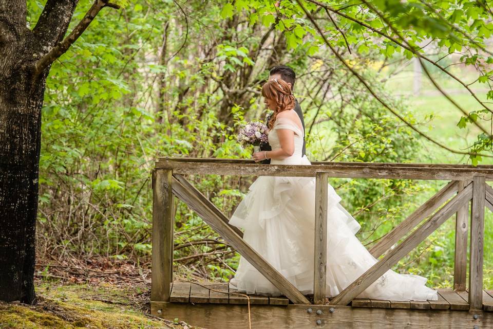 Bride across bridge