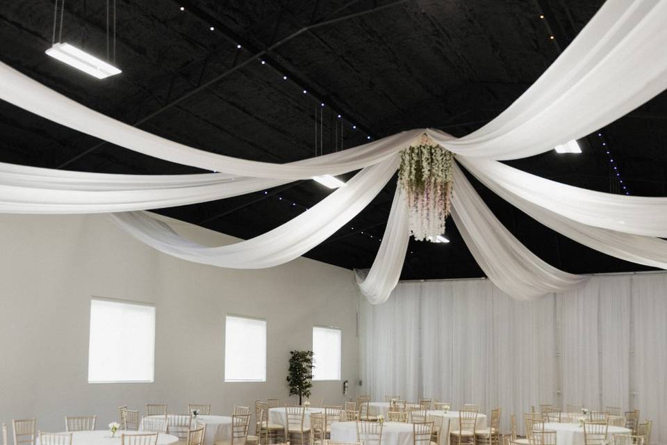 White Drapery Wall to Ceiling