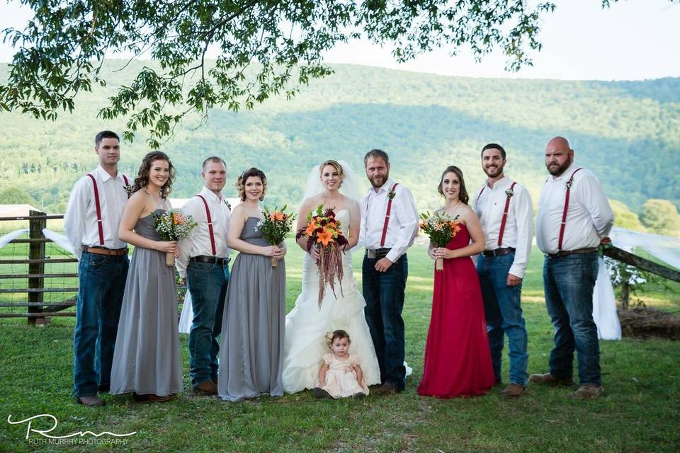 Couple with bridesmaid and groomsmen