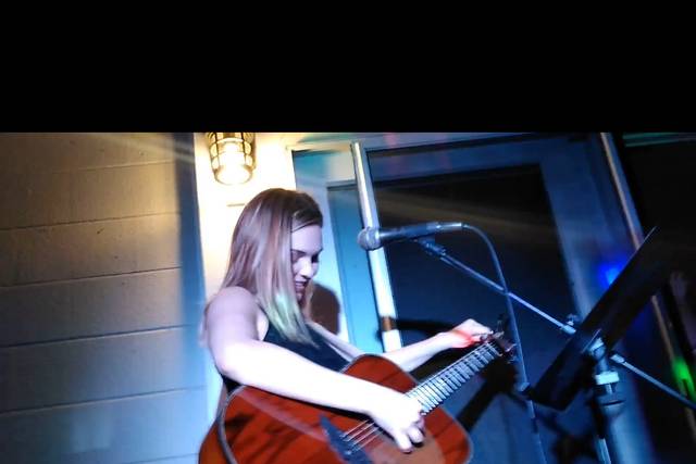 Christina playing guitar