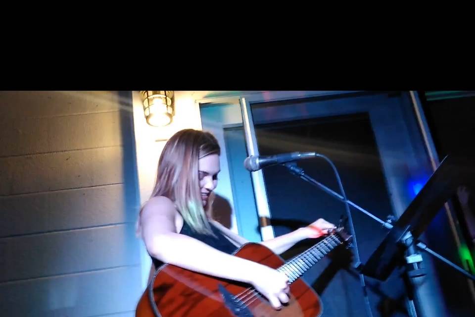 Christina playing guitar