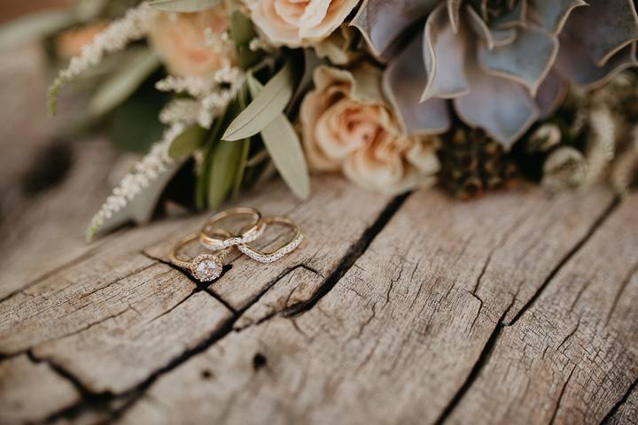 Rings with flowers in background
