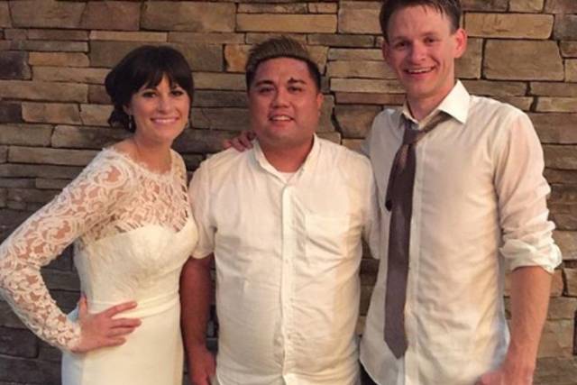 With the bride and groom