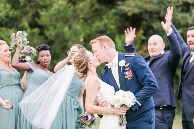 The newlyweds kiss