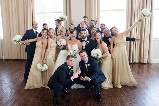 Wedding party in happy and goofy poses