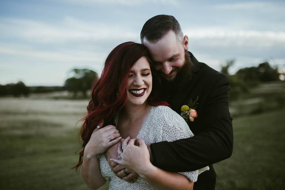 Groom hugging his bride | Rachel Lee Photography