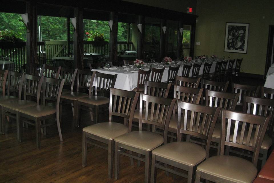 Ceremony and Dinner set-up for a 20-person WeddingWoods Room (pre-renovation)