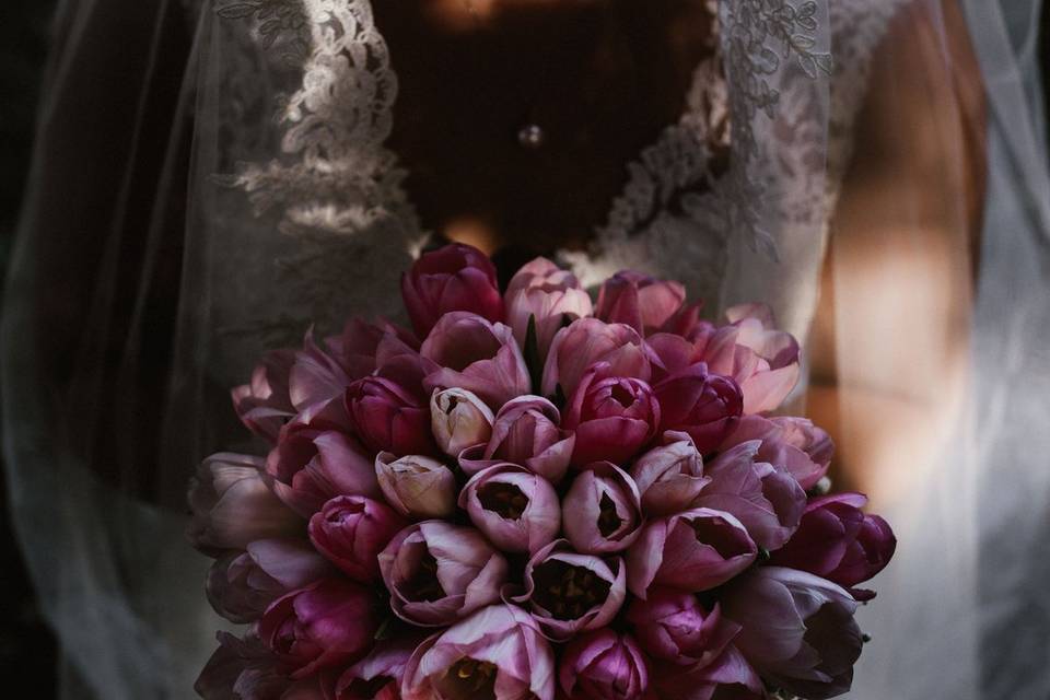 Bride holding wedding flowers