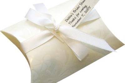 An ivory embossed pillow box of soap - talk about adorable!  This pillow box contains 1.5 ounces of your choice of soap, and is adorned with antique white satin ribbon and a custom made tag.