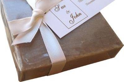 This is 3 ounces of your choice of soap, wrapped in clear cellophane and adorned with antique white satin ribbon and a custom made name and message tag for your event.