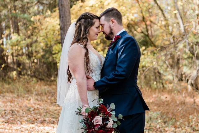 Couple standing in a magical woodland