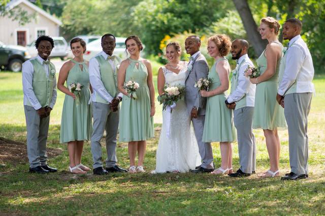 The wedding party standing outside