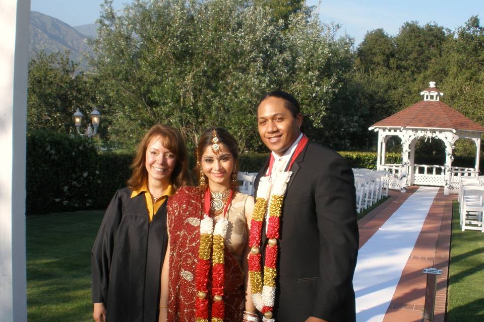 Officiant and the newlyweds