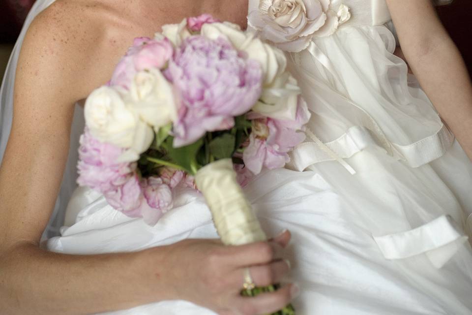 Flower girl kissing the bride