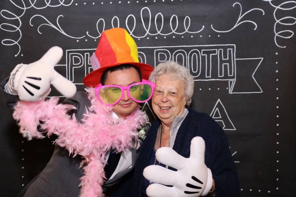 The groom having fun with his grandmother