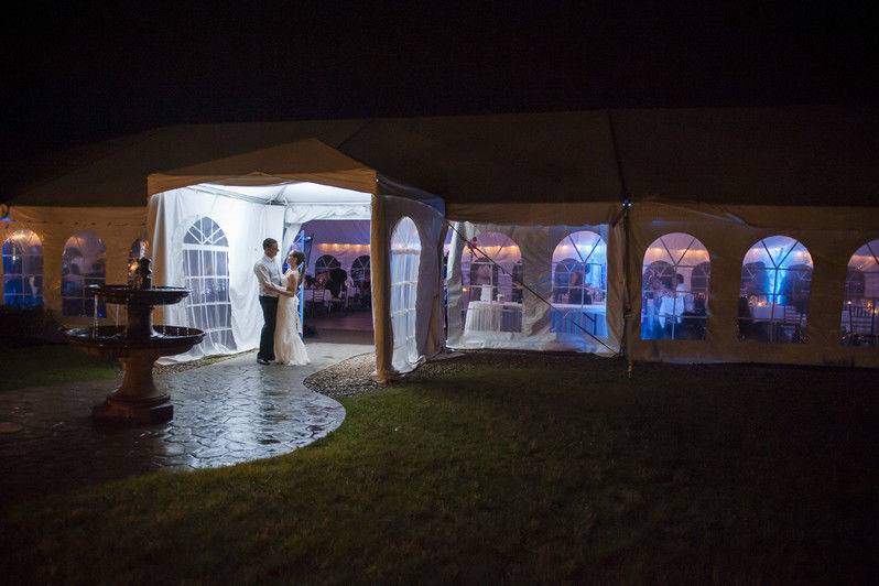 Couple dancing outside the tent
