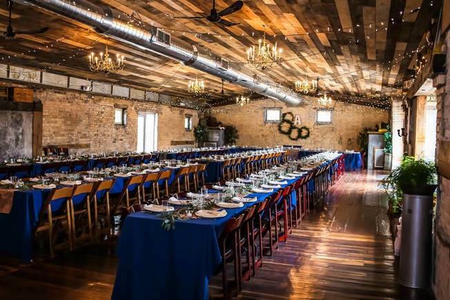 Long tables with blue tablecloths