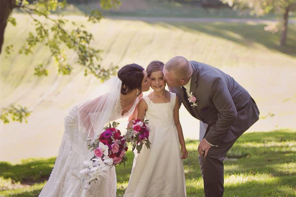 The couple with the flower girl