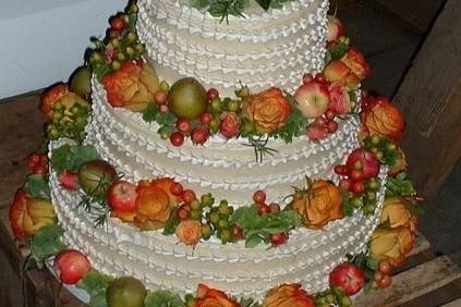 Three tiered carrot cake decorated by Noreen at Earth Blossoms in Harwinton, CT.