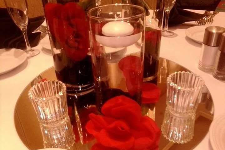 Centerpiece with flower and floating candles