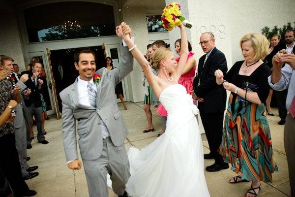 Couple raising hands