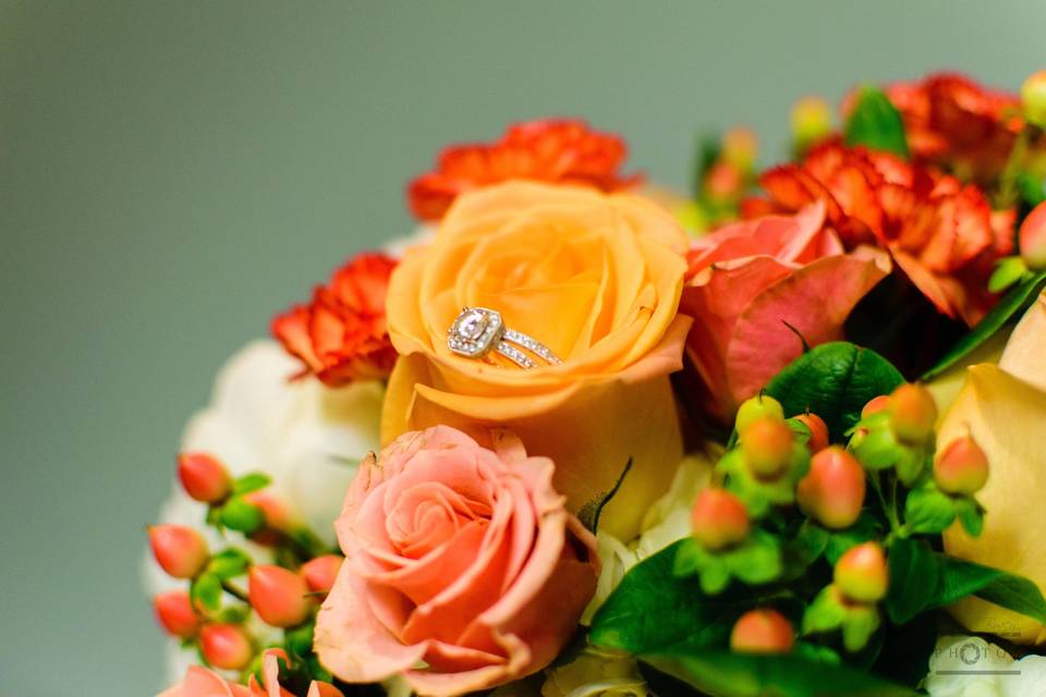 Ring hidden among colorful blooms