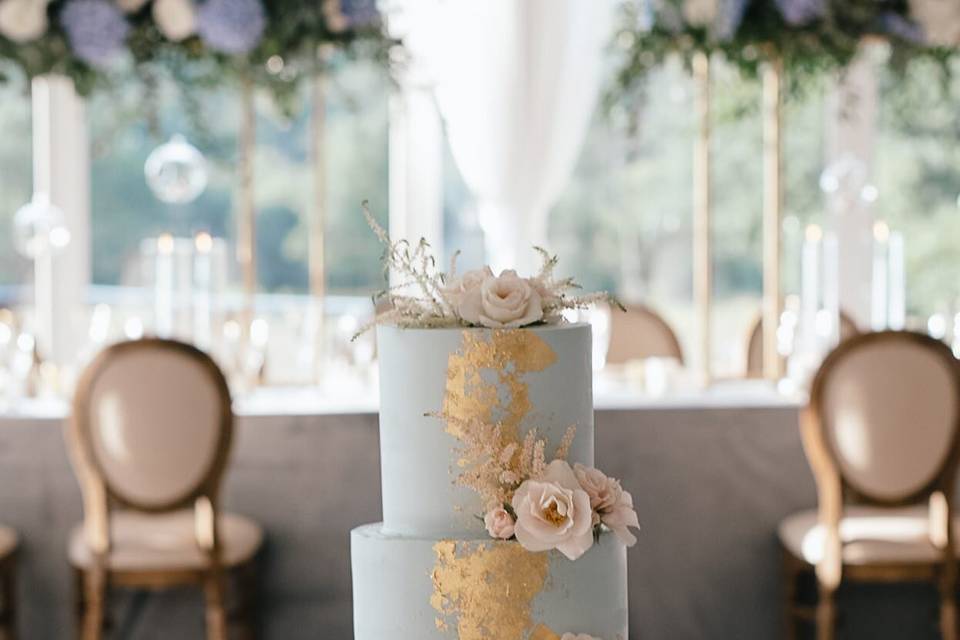 Sage green-colored wedding cake