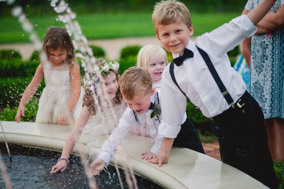 Kids playing in the fountain