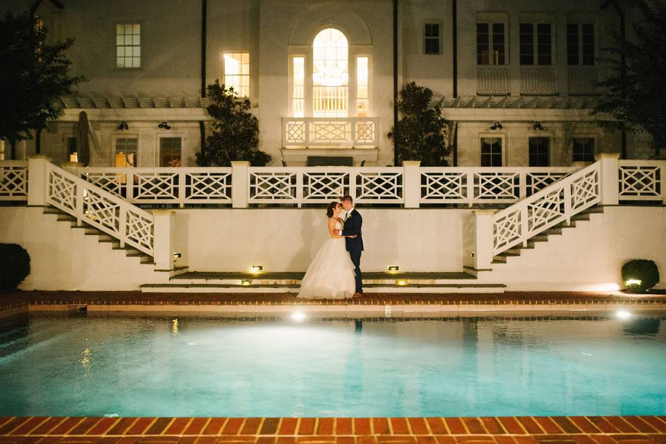 Couple w/the glowing pool