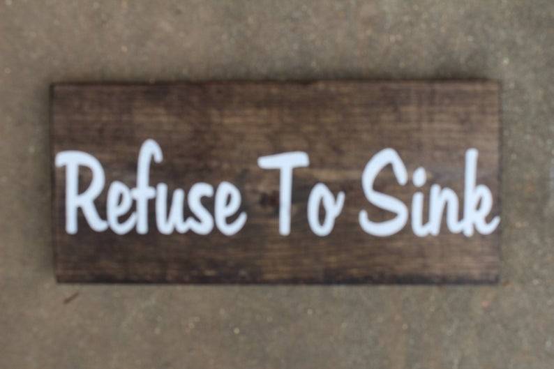 Dark Stained Wooden Sign
