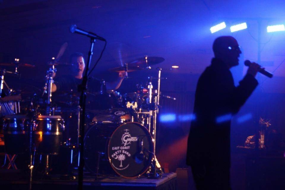 A dreamy pic of Jason MC'ing a bridal party event at a reception in Columbia SC