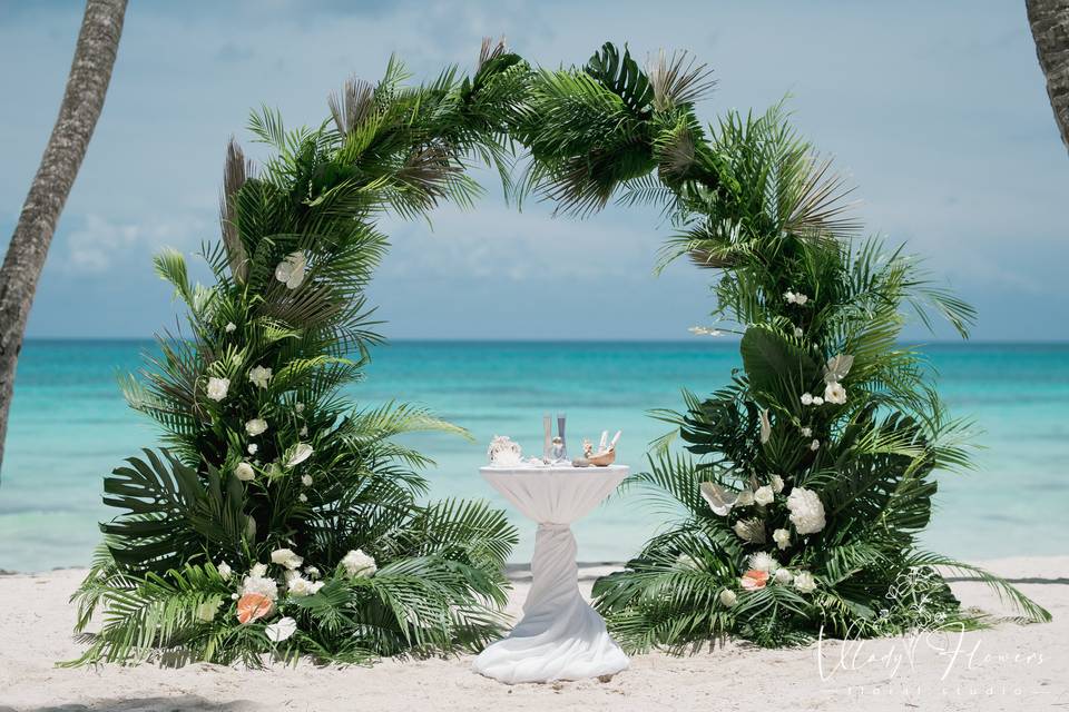 Tropical wedding arch
