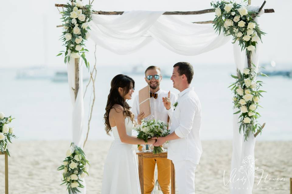 White & green wedding arch