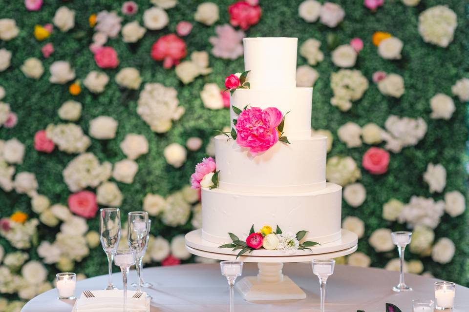 Cake and floral wall