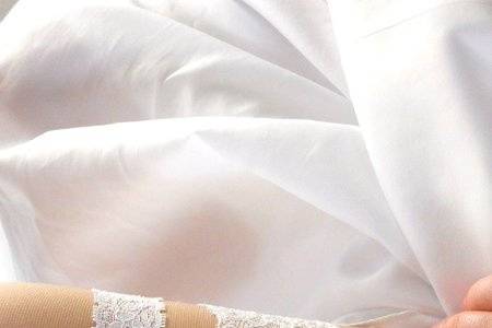 Elegant yet simple, stretch lace and crystal rhinestone bridal garter set.