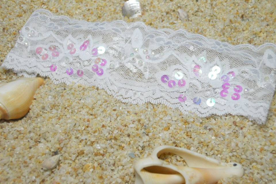 Simple yet elegant, my stretch lace garter sprinkled with a spattering of iridescent sequins.