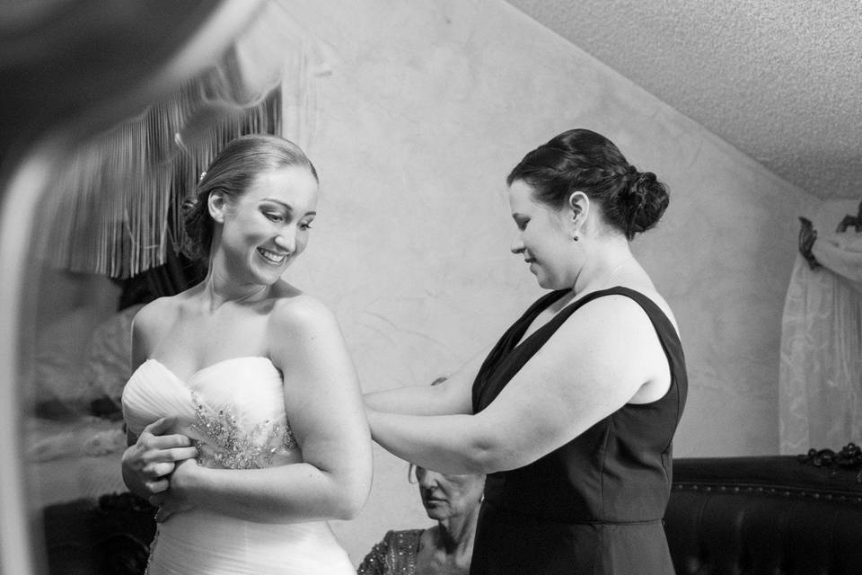Bride getting dressed | Adore Photography