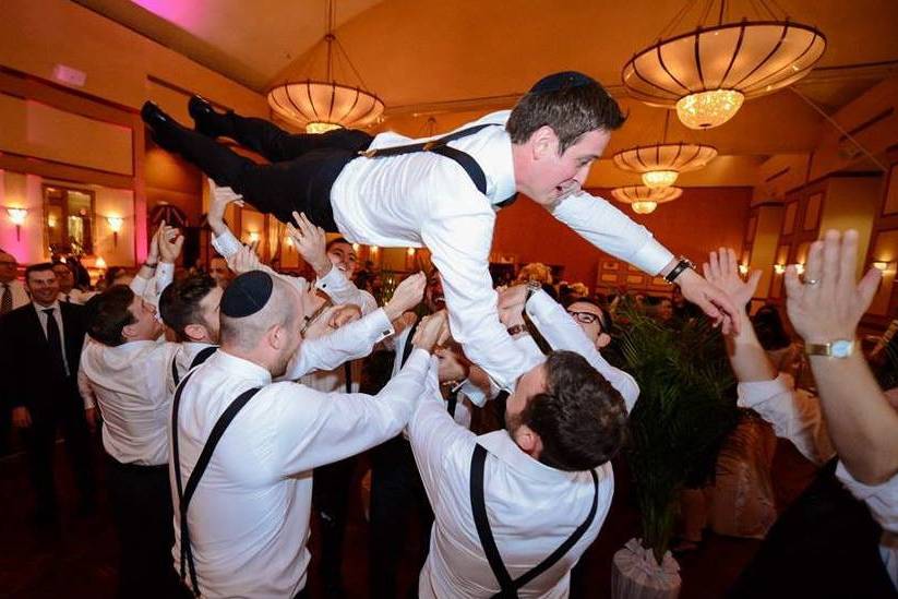 Throwing groom into the air