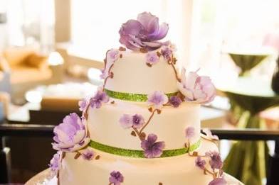 Wedding cake with purple flowers, Photo Credit: Epic Vow Photography