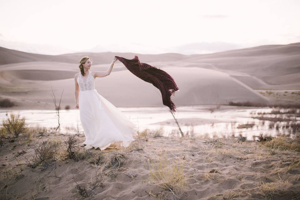 Holding a red shawl in the breeze, Photo Credit: Green Blossom Photography