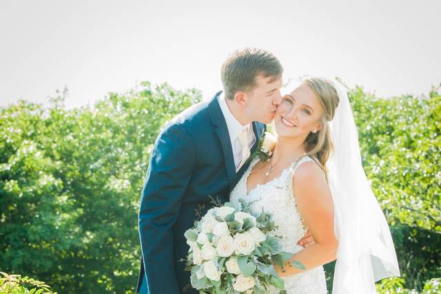 Newlyweds kissing