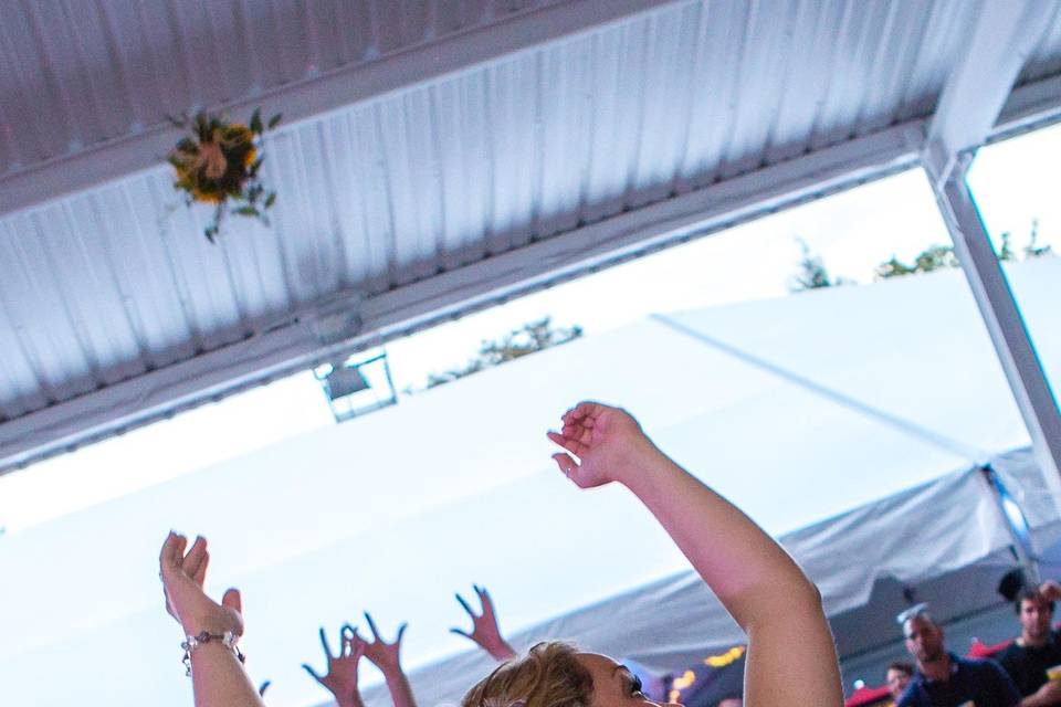 Bride throwing the bouquet