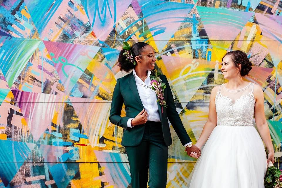 Couple in front of Wall Mural