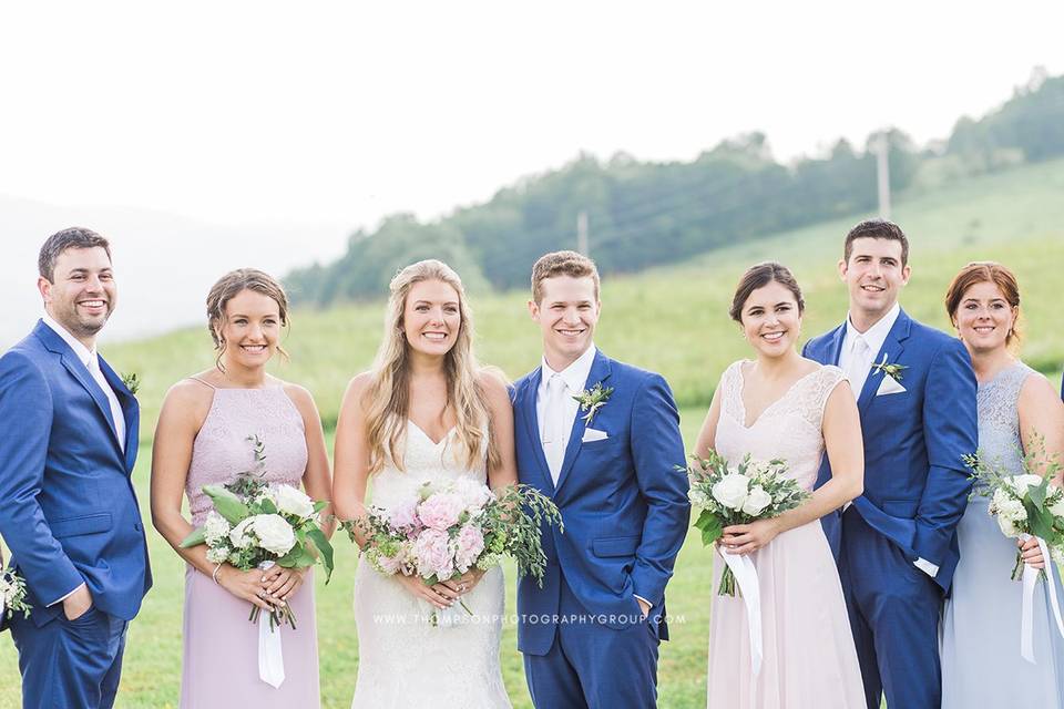 Smiling wedding party