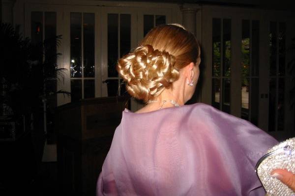 A New Orleans Wedding.  This is the mother of the bride her hairstyle was created with hair pieces added to her existing hair.  I was flown to New Orleans to create hairstyles and Make-up enhancement for five days of events leading up to the wedding. Tons of fun.