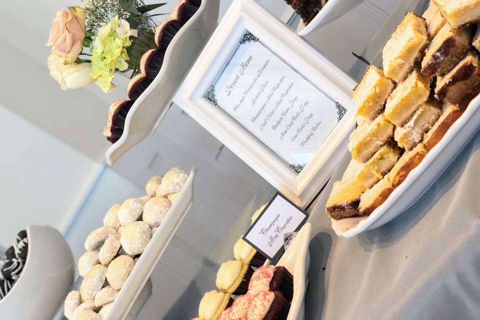 Our couple's family made them with amazing desserts, Sisters created their dessert bar.