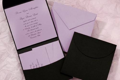 This lilac invitation and accessories are wrapped up in a black pocket for a fresh new look. Matching lilac envelopes add a sense of style to your ensemble.