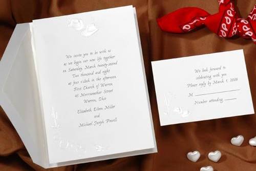 This bright white card features pearl embossed cowboy hats and hearts. Add some country western charm to your wedding day.